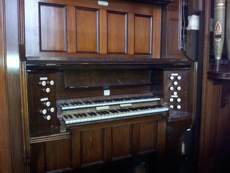 The organ console before restoration