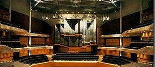 David Wood managing director wood pipe organ builders gives guided tour of organ in Bridgewater Hall, Manchester