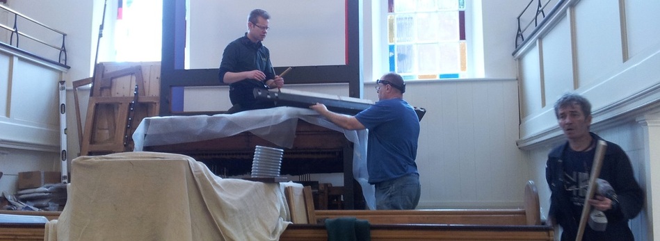 Craftsmen from Wood Pipe Organ Builders, Huddersfield, reassemble organ in George Street Chapel, Oldham, following comprehensive restoration